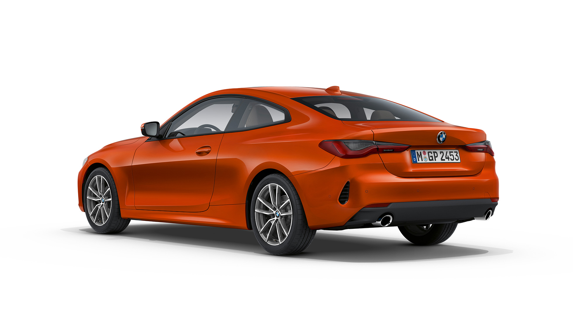 BMW Serie 4 Coupé G22 2020 Equipamiento de serie Sunset Orange metalizado Vista de tres cuartos de la zaga